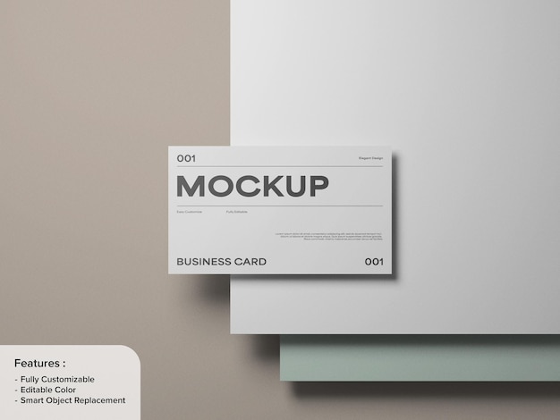 business card placed on layers of white and soft pastel colors