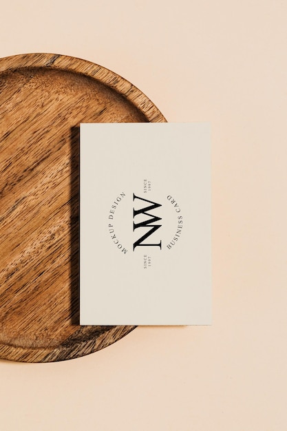 A business card with the letter w on it