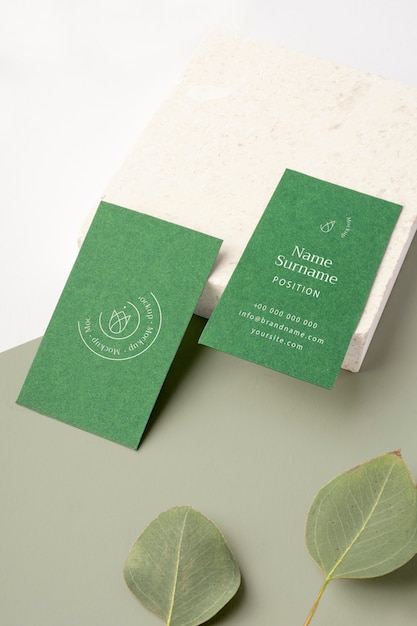 Business cards arrangement with leaves