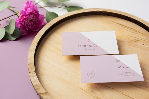 Business cards on wooden board high angle