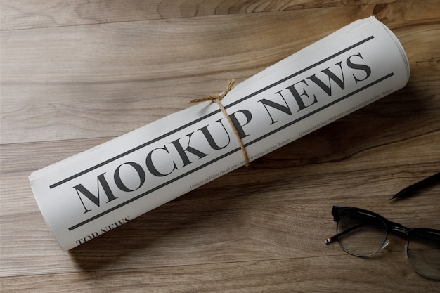 PSD business newspaper mockup template with glasses