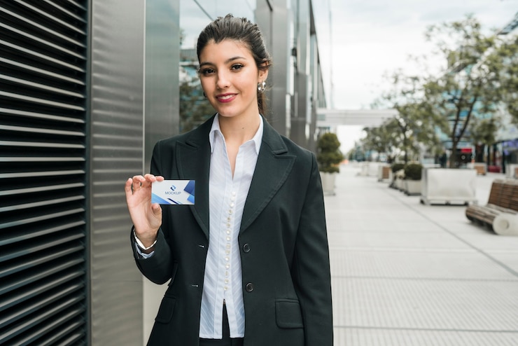 PSD business woman holding visit card template