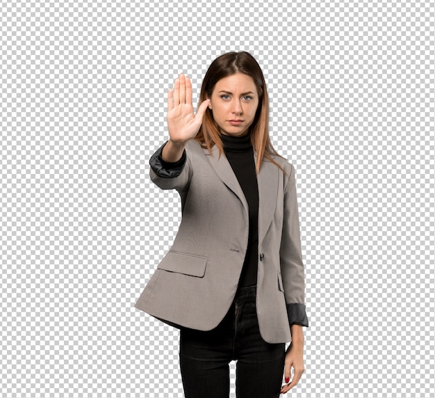Business woman making stop gesture denying a situation that thinks wrong