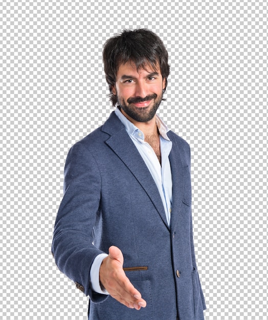 Businessman making a deal over white background