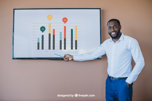 businessman presenting charts on tv screen