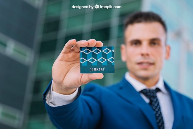 Businessman showing business card