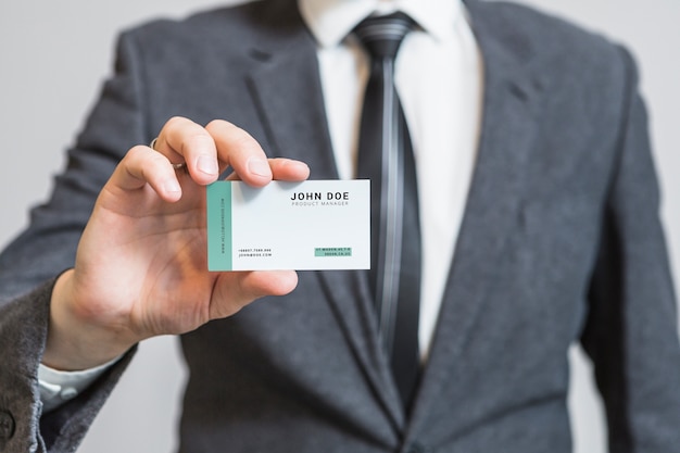 Businessman showing business card