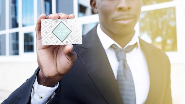 Businessman showing business card