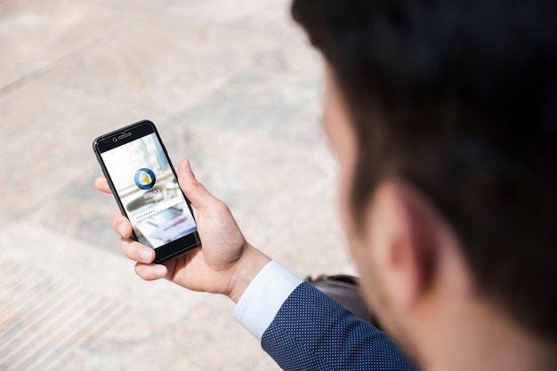 Businessman using smartphone mockup