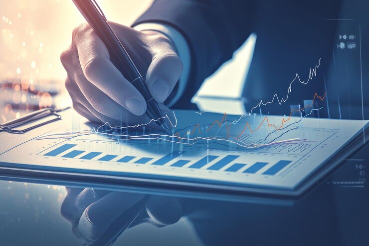 PSD a businessmans hand writing on a clipboard with financial charts and graphs symbolizing analysis strategy and growth