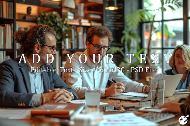 PSD businessmen working together at a table in an office space