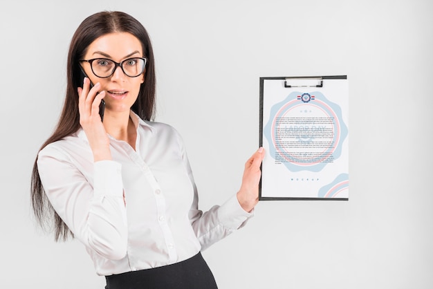 PSD businesswoman holding clipboard mockup for labor day