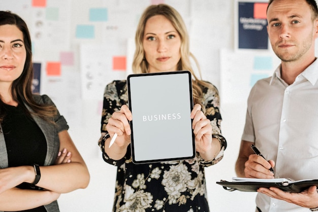 Businesswoman holding a digital tablet mockup