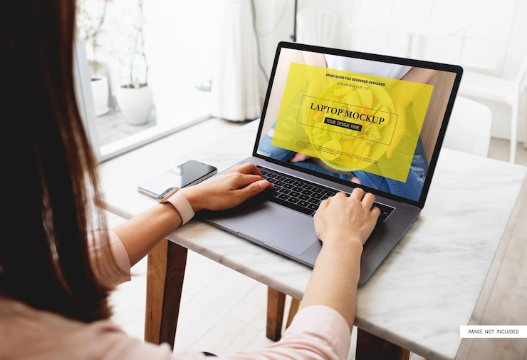 PSD businesswoman using laptop working in coffee shop laptop pro premium 15 inch mockup