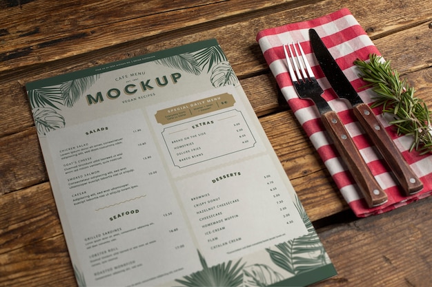 PSD cafe menu mock-up with paper