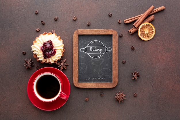 Cake with cinnamon black coffee and blackboard mockup