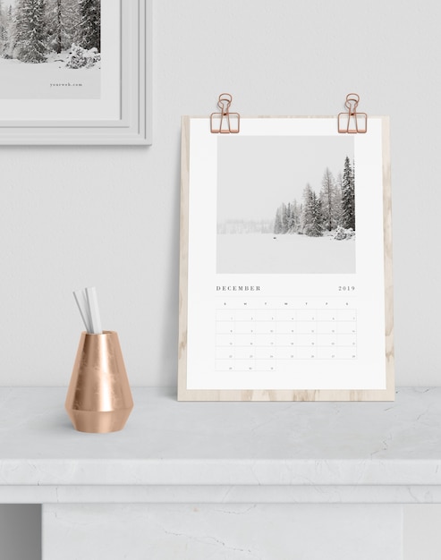 Calendar hooked on wooden board