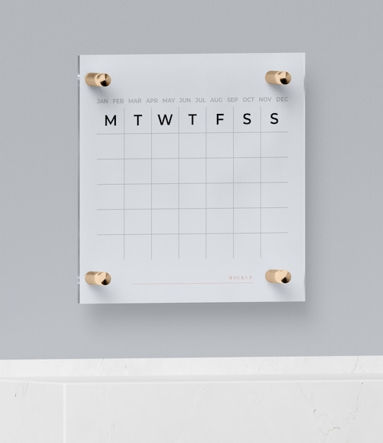 Calendario appuntato sul muro mock-up