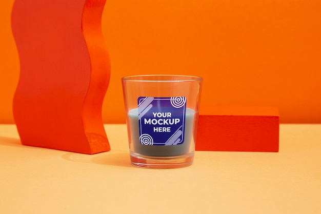 Candle in a glass with packaging mockup