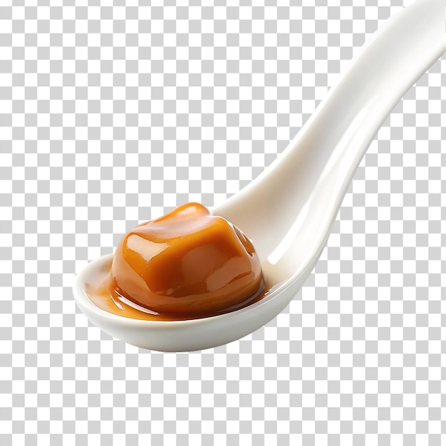 PSD caramel on white spoon isolated on transparent background