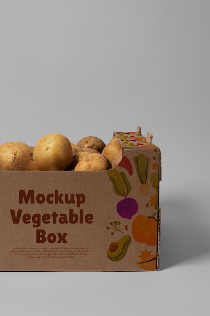 PSD carton box with fresh potatoes mockup