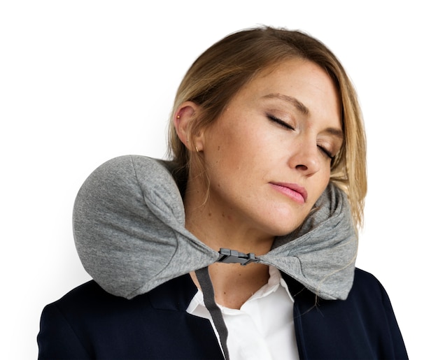 Caucasian woman travel pillow resting