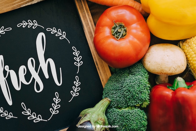 PSD chalkboard mockup with vegetable designs