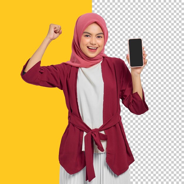 Cheerful beautiful asian woman in casual shirt holding mobile phone with blank screen and celebrating success