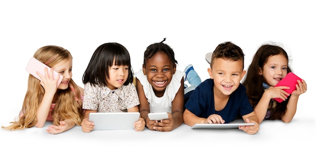 PSD cheerful children holding digital devices