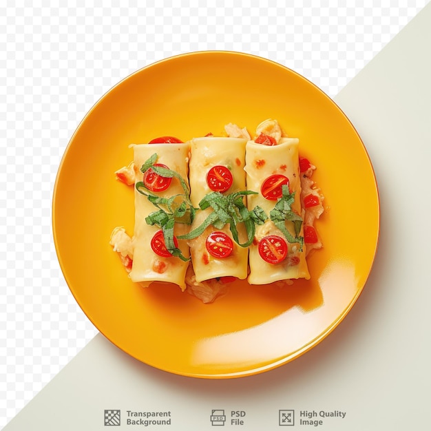 PSD cheese filled pasta topped with pepper and tomato on a black plate