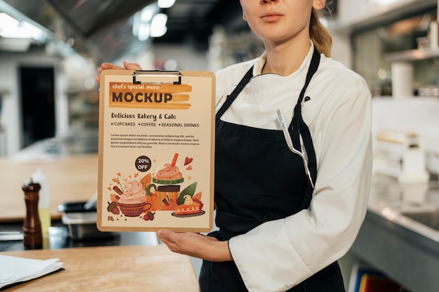 PSD chef holding menu mockup design