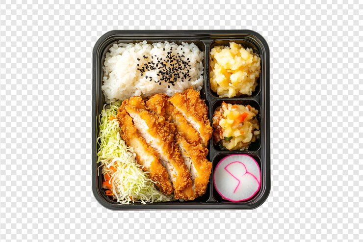 PSD chicken katsu bento box with rice and vegetables on a transparent background