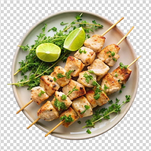 PSD chicken souvlaki with thyme and lime slice isolated on white background