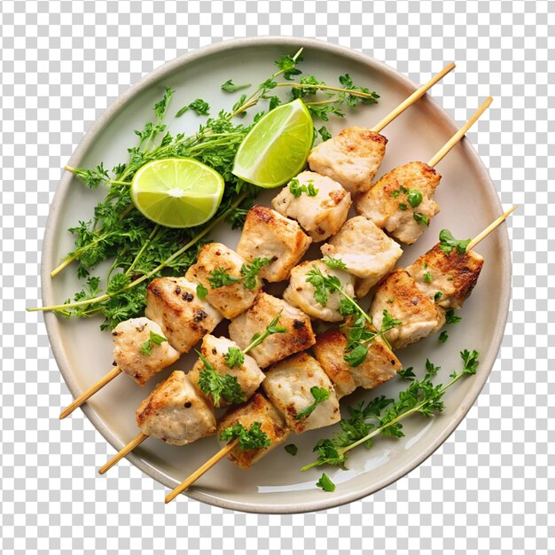 PSD chicken souvlaki with thyme and lime slice isolated on white background