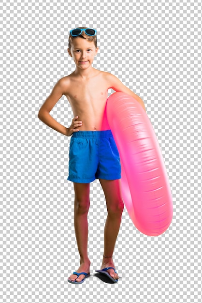 PSD child on summer vacation posing with arms at hip