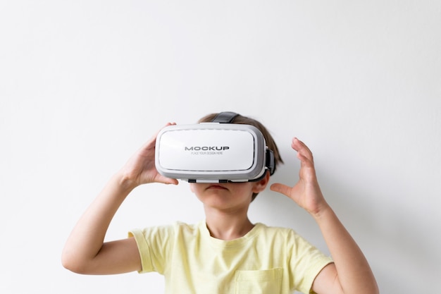 PSD child wearing vr glasses mockup