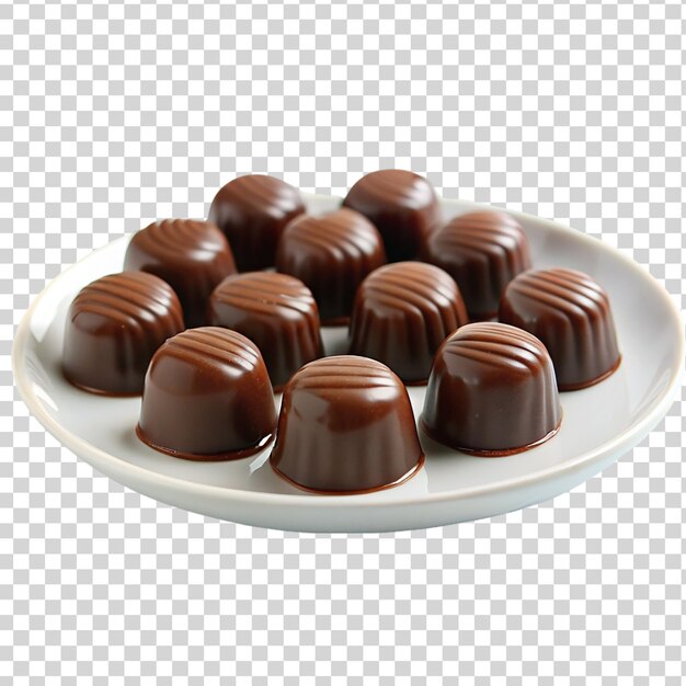 Chocolate candies on white plate isolated on transparent background