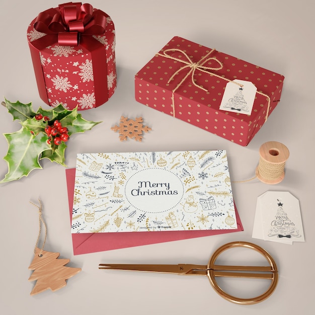 Christmas card and gifts collection on table