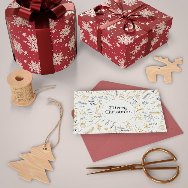 Christmas card with gifts beside