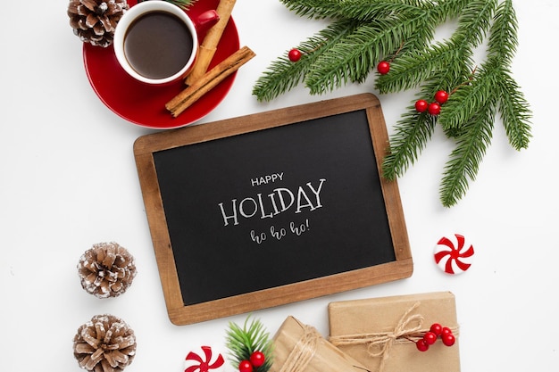 Christmas greeting on black board on a white background