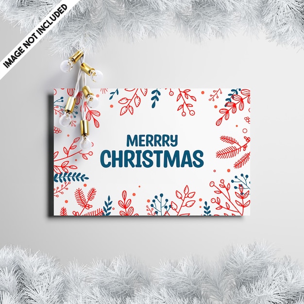PSD Шаблон макета рождественской открытки с сосновыми ветками и листьями