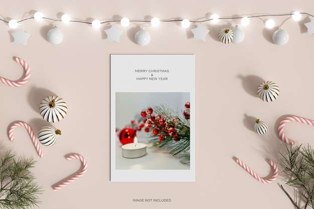 PSD christmas holiday greeting design with candy and pine leaf mockup