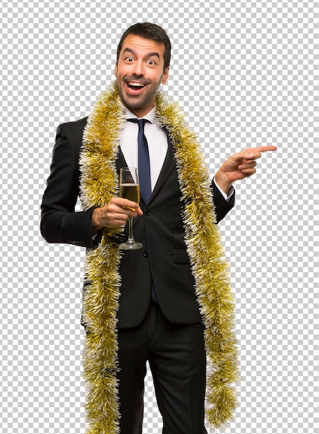 Christmas holidays event. man with champagne celebrating new year 2019