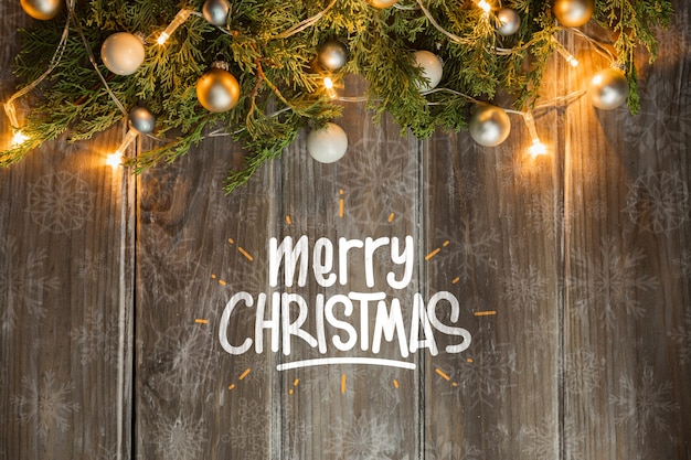 Christmas lighted coronet on wooden table