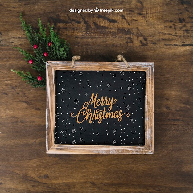 PSD christmas mockup with slate and mistletoe