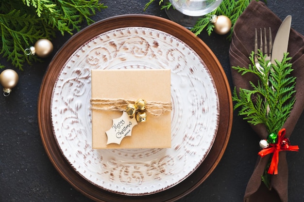 Christmas Table Setting With Gift Box. Winter Festive background. Mockup