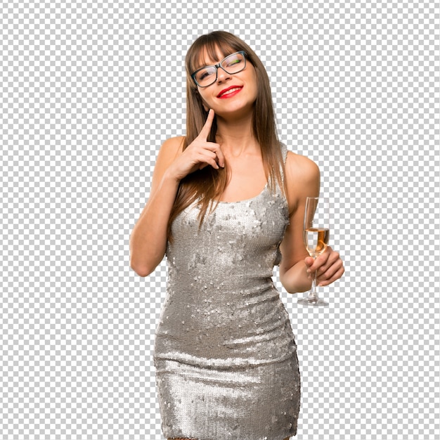 Christmass holidays. woman wearing a sequined dress with champagne celebrating new year 20