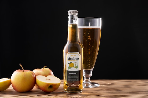 PSD cider bottle mockup with fruits