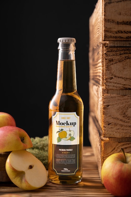 PSD cider bottle mockup with fruits