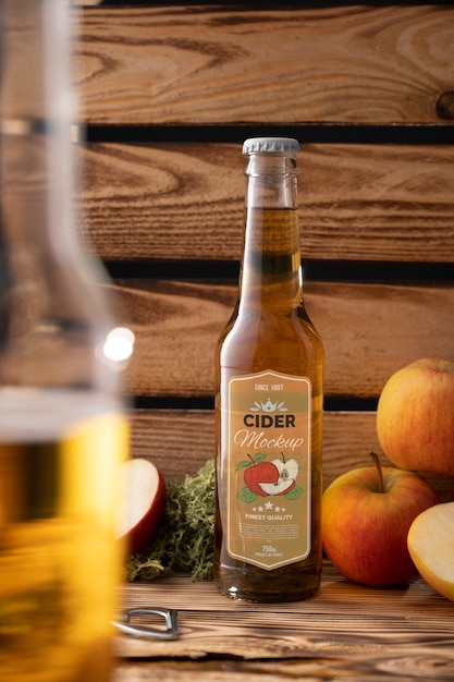 PSD cider bottle mockup with fruits